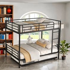 the bunk bed has two pillows on it and is in front of a bookcase