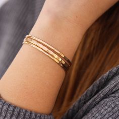 Featuring all the individuality and uniqueness that is inherent in nature, the widest of the Lotus Stone Jewelry cuff collection is just lovely. This gold cuff has a simple, organic hand-hammered texture, a custom fit for your wrist size, and a gold filled body that will wear like solid gold. This wide cuff is 4.5mm wide and is a strong and bold bangle. Gold Cuff Bracelet, Simple Organic, Gold Bracelet Cuff, The Lotus, Hammered Gold, Gold Cuffs, Wide Cuff, In Nature, Stone Jewelry