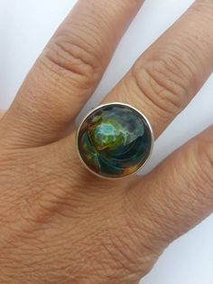 Check out this item in my Etsy shop https://www.etsy.com/listing/715870501/sterling-silver-hammered-colorful-glass Artistic Hand Painted Round Rings, Modern Multicolor Handmade Rings, Unique Multicolor Rings With Polished Finish, Modern Iridescent Round Rings, Modern Iridescent Round Ring, Artistic Round Cabochon Jewelry, Unique Multicolor Nickel-free Rings, Artsy Round Green Jewelry, Unique Multicolor Cabochon Rings