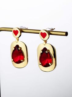 These enamel heart earrings with glass stone will add a simplistic yet classy touch to any style. Handmade in a classic shape, it is elegant whether dressed up or down. by skilled artisans in India, each piece radiates craftswomanship and effortlessly cool style. DETAILS Approx. 1.2"H x .58"W 18K Gold-plated brass Glass stone Hard enamel Steel posts 100% lead & nickel free Imported Photo: Aggy-wide-GRjA0oZDosE-Unsplash Elegant Enamel Heart Cut Jewelry, Elegant Heart Cut Enamel Jewelry, Gold Enamel Heart Earrings, Elegant Enamel Heart Earrings For Gift, Heart Charm Enamel Earrings, Heart-shaped Enamel Earrings With Charm, Enamel Earrings With Heart Charm As Gift, Elegant Heart Enamel Earrings For Gift, Enamel Heart Charm Earrings As Gift