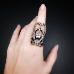 "Temporary August Shipping Delays. Orders may take 7-10 business days to ship. Lead-free pewter cast art nouveau design with center (life-cast) hummingbird skull adjustable ring. 1.5\" x ⅞\" Always ethically sourced bones. Nothing has ever been harmed for the purpose of our jewelry. All pieces are made-to-order despite the \"in stock\" number in the listing. Time frame varies from piece to piece so please message us if you need something by a certain date and we will do our best. A portion of ou Gothic Adjustable Hand Cast Skull Ring, Unique Adjustable Hand Cast Skull Ring, Vintage Adjustable Silver Skull Ring, Art Nouveau Silver Brass Jewelry, Hummingbird Skull, Design Art Nouveau, Life Cast, Cast Art, Whimsical Jewelry