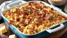 a casserole dish with bacon and cheese in it