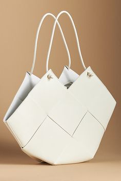 Leather Removable top zip pouch Tie closure Imported | Taylor Contexture Leather Bag by Bob Oré in White, Women's at Anthropologie Modern Structured Bags With Removable Pouch, Modern Structured Bag With Removable Pouch, Structured Shoulder Bag With Removable Pouch, Structured Bags With Removable Pouch, Versatile Structured Shoulder Bag With Removable Pouch, Modern Structured Bags In Soft Leather, Structured Leather Bag For Daily Use, Structured Bag With Removable Pouch For Daily Use, Versatile Structured Soft Leather Bag