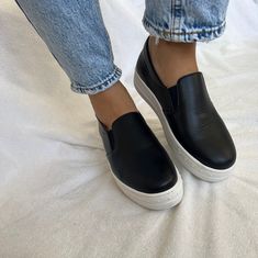 Black leather slip on shoes with white sole that are easy to wear and very comfortable while walking. They are made from full grain leather, the sole is made from rubber and the total quality promises the best footwear experience. Find them only at Chrtistina Christi store. 👉 My Leather Shoes Collection: https://etsy.me/3TS9NJ2 👉 Express Shipping: https://etsy.me/3ikUnOM DESCRIPTION - Outside and inside with real leather. - Rubber Sole 3.5 cm height. - Made in Greece SIZE PROPOSAL - Normal to Sporty Leather Slip-ons With Vulcanized Sole, Casual Leather Slip-ons With Contrast Sole, Casual Black Slip-ons With Leather Sole, Casual Black Slip-ons With Contrast Sole, Comfortable Black Slip-ons For Everyday, Black Leather Slip-ons With Stitched Sole, Modern Black Slip-ons With Contrast Sole, Leather Slip-on Sneakers With Vulcanized Sole And Round Toe, Black Slip-ons With Leather Footbed