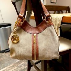 Nwt Micheal Kors Canvas And Leather Tote Bag.. Side Zippers Are Functional.. Taupe Linen Brown Leather .. Inside Zippers And Snap Closure .. Paid $400 Everyday Canvas Bags With Metal Hardware, Everyday Canvas Bag With Metal Hardware, Canvas Bags With Metal Hardware For Daily Use, Leather Tote Bag, Leather Tote, Snap Closure, Side Zipper, Brown Leather, Satchel