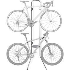 a bicycle is mounted on the side of a metal pole with four bikes attached to it