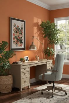 a home office with orange walls and wooden flooring, an upholstered chair is in front of the desk that has a potted plant on it