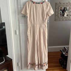 J.O.A. Natural Linen Jumpsuit With Back Tie Detail. Nwt! Tag Says Large But Can Definitely Fit Medium Sizes. Embroidered Cotton Jumpsuits And Rompers For Spring, Casual Embroidered Jumpsuits And Rompers For Spring, Spring Embroidered Fitted Jumpsuits And Rompers, Embroidered Fitted Jumpsuits And Rompers For Spring, Olive Green Jumpsuit, White Lace Romper, Sleeveless Jumper, Urban Outfitters Women, Floral Print Rompers