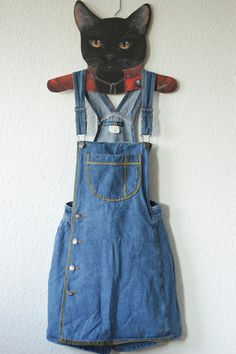 Upcycled Vintage Blue Bronze Denim Dungarees Skorts Size S, see below for measurements Brand: Dixie Blues, Authentic Original 100% cotton side button placket with breast pocket looks like a dungaree dress at first glance there are shorts under the skirt this vintage piece was painted with shimmering gold textile paint now a real eye-catcher and absolutely unique piece Vintage condition: VERY GOOD, only a small material defect on the back Waist size: approx. 33cm Length: approx. 82 cm (but can be High-waist Blue Denim Dress, Fitted Denim Shortalls With Pockets, High Waist Blue Shortalls With Pockets, Blue Denim Overalls With Bib Front, Fitted Denim Blue Shortalls With Pockets, Medium Wash Denim Jumpsuit With Belt Loops, Fitted Denim Shortalls In Dark Wash, Casual Blue Denim Jumpsuit With Belt Loops, Fitted Dark Wash Denim Shortalls