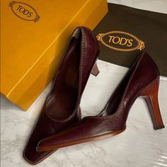 Tod’s - Leather Pumps Never Been Worn. In Excellent Condition. Slight Creases From Trying On And Storage. Burgundy, Cognac Color. Pointed, Square Toe. #Tods #Todsshoes #Todsheels #Todsitaly #Italy #Italianleather #Italian #Leather Fitted Leather Heels With Square Toe, Brown Fitted Leather Heels, Fitted Brown Heels For Formal Occasions, Formal Fitted Brown Heels, Classic Tan Leather Heels, Luxury Tan High Heel Shoes, Fitted Leather Heels With Leather Lining, Luxury Tan Heels With Round Toe, Luxury Tan Round Toe Heels