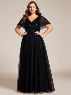 Dazzle at your next event in our Sparkly Sequin A-Line V-Neck Tulle Formal Evening Dress. This stunning dress features a flattering V-neckline and an A-line silhouette adorned with shimmering sequins. The tulle overlay adds a touch of ethereal elegance, making it perfect for formal occasions. Designed to ensure comfort and style, this dress will make you the center of attention. Fit: Please refer to size chart. Length: Floor Length. Sleeve Style: Short sleeves. Closure: It is concealed a zipper up the back. Undergarments: It is not padded, with lining. Fabric:The garment comprises sequin. Stretch: Fabric is no stretch. Evening Gown Plus Size Elegant, Elegant V-neck Tulle Dress, V-neck Tulle Evening Dress For Wedding, Fitted V-neck Tulle Dress, Tulle V-neck Evening Dress For Wedding, Tulle V-neck Bridesmaid Dress For Wedding, Formal V-neck Dress For Gala, V-neck Tulle Bridesmaid Dress, Short Sleeve Tulle Bridesmaid Dresses