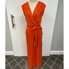 New Without Tags, Orange Jumpsuit With Tie Waist Detail And Pockets. Orange Jumpsuits And Rompers For Work, Fitted Orange Jumpsuits And Rompers For Work, Fitted Orange Jumpsuits For Work, Spring Orange Fitted Pantsuit, Fitted Orange Pantsuit For Spring, Burnt Orange Jumpsuit, Orange Jumpsuit, Burnt Orange, Color Orange