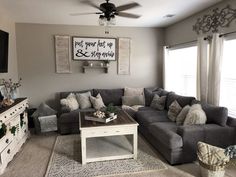 a living room filled with furniture and a flat screen tv