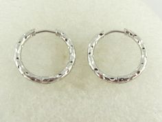 The stainless steel silver hoop earrings have an outside diameter of approx. 21mm. They are approx. 2.4 mm thick. They have a hook closure. Open the hook and let it snap back into place. The earrings are delivered in a pretty jewelry box. The hoop earrings in my shop are also available in gold, as are other hoop earrings in different sizes and colors. If you have any other wishes, please contact me. **Used material** Stainless steel hoop earrings silver pair ** Size / mass / weight ** see description / very easy ** Production method ** Made for you You can find even more jewelry here: https://www.etsy.com/de/shop/GlasschmuckBirgitH Stainless steel is a very strong material on the one hand and a very light metal on the other. A typical feature of stainless steel is the surface, which appear Hoop Earrings Silver, Steel Gifts, Pretty Jewelry, Snap Back, Hammered Silver, Pretty Jewellery, Silver Hoops, Silver Hoop Earrings, Earrings Silver