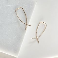 Live in Links™️ // for busy babes + mamas who never have enough time. Cute, comfortable, lightweight jewelry in 14K gold fill + sterling silver so you can live in your links and feel put together day in, day out.P R O D U C T D E T A I L S :. 14K gold filled round wire slightly hammered to catch light and add texture, then hand shaped into crisscross ear threaders. minimal, modern, dainty + edgy. easily thread through your piercings, no earring backs necessary. earring length is approximately 1 Minimalist Hammered 14k Gold-filled Jewelry, Dainty Hypoallergenic Jewelry For Everyday Elegance, Hypoallergenic Dainty Elegant Jewelry, Everyday Hypoallergenic Recycled Gold Jewelry, Simple Everyday 14k Gold Jewelry, Rose Gold 14k Jewelry For Everyday Elegance, Everyday Hypoallergenic 14k Gold Jewelry, Everyday Elegant Rose Gold 14k Jewelry, Everyday Elegance 14k Rose Gold Jewelry