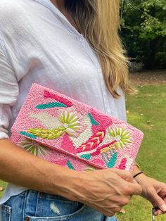 A hand sewn double sided beaded and embroidered clutch purse in pink with multi-colored embroidered flowers. Each clutch is unique and has individual characteristics. The silver chain strap can be worn as a crossbody or over the shoulder or as a clutch without a strap. This is a beautiful and unique clutch you will love! Rose Vibe, Pink Vibe, Embroidered Clutch Purse, Embroidered Clutch Bag, Unique Clutch, Beaded Clutch Purse, Embroidered Clutch, Pink Beaded, Pink Vibes