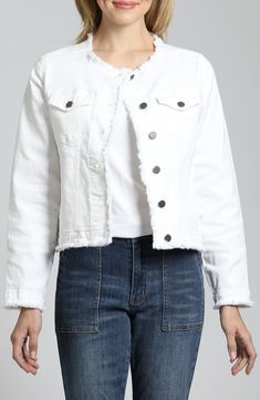 A fun update to a classic style, this stretch-denim jacket features softly frayed edges and a fitted, collarless silhouette for casual-chic layering. Front button closure Collarless Button cuffs Chest button-flap patch pockets 70% cotton, 28% polyester, 2% elastane Machine wash, tumble dry Imported Asian Owned/Founded Fall Cotton Denim Jacket With Frayed Hem, Cotton Denim Jacket With Frayed Hem For Fall, Chic Cotton Outerwear With Frayed Hem, Long Sleeve Cotton Denim Jacket With Frayed Hem, Cotton Denim Jacket With Frayed Hem, Chic Spring Denim Jacket With Frayed Hem, Chic Spring Outerwear With Frayed Hem, Trendy Spring Outerwear With Frayed Hem, Casual Cotton Outerwear With Frayed Hem