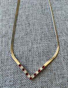 Vintage Avon Gold Tone V Necklace Garnets Rhinestones 16" | eBay Vintage Avon Jewelry, V Necklace, Avon Jewelry, Vintage Avon, The 1970s, Childhood Memories, Antique Jewelry, Garnet, Size 16