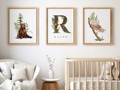 a baby's room with three framed pictures on the wall