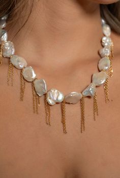 The Sunset Pearled Necklace features oversized pearls, meticulously selected for their radiant luminosity and exquisite quality. The combination of pearls and chains evokes a sense of modern sophistication while paying homage to the classic charm of pearls. Pearl White Pearl Necklace With Chain, Party Pearl Necklace With Pearl Pendant, Long Pearl Necklace With Pearl Charm For Party, Long Pearl Pendant Necklace For Parties, Long Pearl Necklace With Pearl Chain For Party, White Pearl Charm Chain Necklace For Formal Events, Luxury Pearl Embellished Necklaces For Parties, White Chain Necklace With Pearl Charm For Formal Occasions, Long Pearl Chain Necklace For Party