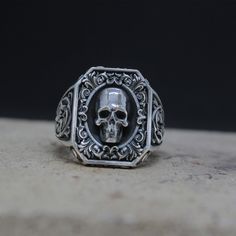 Royal Vintage Skull Rococo Signet Ring, Biker Ring, Punk Silver Ring, Gothic High Skull Ring, Oxidized Jewelry, Handmade Silver Ring For Men Elevate your style with our sophisticated silver rings for men. Crafted from high-quality materials, each piece is designed to stand the test of time while providing a touch of modern elegance to your look. Our collection includes a wide range of designs to suit any taste, from classic and simple bands to more intricate and unique styles. Whether you're dressing up for a formal occasion or looking to add a touch of polish to your everyday style, our silver rings for men are the perfect choice. Shop our collection now and find the perfect piece to express your individuality and enhance your wardrobe. ⭐ Check out our store for more unique design jewelry Symbolic Skull Rings For Halloween, Halloween Skull Rings Symbolic Style, Punk Skull Rings As Gift, Gothic Skull Print Rings For Halloween, Biker Style Skull Jewelry, Handmade Punk Skull Rings, Gothic Silver Ring With Skull Print, Gothic Skull Jewelry For Biker Events, Vintage Handmade Skull Ring