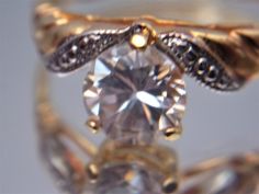 Beautiful CZ Lindenwold solitaire ring. Size 10. 14k heavy gold electroplate. Made in the USA. New old stock. It has it's original tag. Add it to your jewelry wardrobe. All sales are final and as is. Thank you for looking. You may also love this: https://www.etsy.com/listing/564149903/cz-marquise-anniversary-band-ring-size?ref=shop_home_active_14&pro=1 Collectible Gold Jewelry With Center Stone, Antique Gold Jewelry With Center Stone, Antique Gold Solitaire Jewelry, Vintage Gold Solitaire Jewelry, Engagement Ring Size, Jewelry Wardrobe, Carnelian Ring, Engagement Ring Sizes, Cz Jewelry