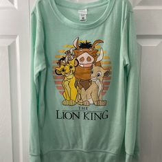 Never Worn! Disney’s The Lion King Mint Green Sweater Tunic Length Very Soft And Warm! 95% Polyester 5% Spandex Smoke Free Home! Disney Long Sleeve Top With Cartoon Print, Themed Long Sleeve Top With Cartoon Print, Themed Long Sleeve Tops With Cartoon Print, Disney Green Tops With Character Print, Green Disney Character Print Top, Cute Long Sleeve Tops For Disney Fan Events, Casual Long Sleeve Tops For Disney Fan Events, Green Disney Crew Neck Top, Minnie Mouse Sweater