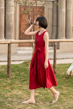 "This red linen dress has a special design. It has different styles. You look even more mod and fashionable in this dress with belt. While, without the belt, it gives a loose and relax looking. It will be your wise choice. Your wardrobe needs it. DETAIL * Made of linen, Eco friendly option , luscious fabric, the material is strong yet still flows. * Pleated A line dress * red high loose waist * crew neck line * Two side pockets * Tie belted dress * Sleeveless dress * Midi length * Perfect for su Red Linen Dress, Tie Belt Dress, Shabbat Dinner, Cape For Women, Outdoor Dress, Picnic Dress, Vintage Summer Dresses, Summer Linen Dresses, Wool Clothing