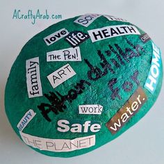 a painted rock with words written on it