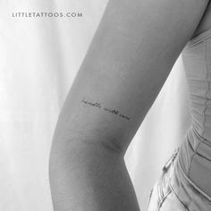 a woman's arm with a small tattoo saying, i love you to the moon and back