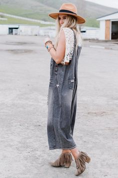 This oversized silhouette is the perfect slouchy relaxed fit. It's washed denim is a loose fit with adjustable button straps and some distressed detailing. Oversized relaxed fit – if you are between sizes, please size down. Model is 5' 8" and wearing a size small. Approximate measurements are as follows: SMALL: Bust: 40" (measured from under arm), Waist: 50, Length: 35" (from under the arm to hem), Inseam: 21" MEDIUM: Bust: 42" (measured from under arm), Waist: 52, Length: 35 1/4" (from under th Maternity Overalls, Boho Vest, Black Overalls, Western Girl, High Hopes, Striped Socks, Knitting Girls, Oversized Silhouette, Washed Denim