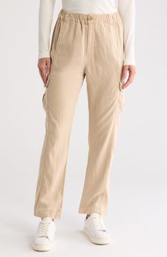 Comfy cargo pants for kicked-back days are cut from linen-kissed twill with an elastic waistband and roomy pockets lending a cool utility vibe. Zip fly with button closure; elastic waist Front and back welt pockets; cargo patch pockets 49% Tencel® lyocell, 28% linen, 21% cotton, 2% elastane Tencel lyocell is a more-sustainably produced fiber made with closed-loop processing Machine wash, tumble dry Made in Turkey Beige Linen Cargo Bottoms, Casual Linen Pants With Multiple Pockets, Utility Linen Cargo Pants With Cargo Pockets, Relaxed Fit Linen Cargo Pants With Pockets, Linen Cargo Pants With Elastic Waistband, Elastic Waistband Linen Cargo Pants, Utility Linen Bottoms With Flap Pockets, Linen Straight Leg Cargo Bottoms, Utility Linen Cargo Pants With Relaxed Fit