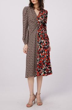 Geometric and floral patterns strike a perfect balance on a long-sleeve midi dress complete with an artfully twisted embellishment below the neckline. Hidden back-zip closure V-neck Long sleeves Unlined 50% viscose, 50% Lenzing™ EcoVero™ viscose Lenzing EcoVero viscose is a more-sustainably produced fiber made using pulp made from renewable wood sources Dry clean Imported Multicolor Midi Dress For Evening In Fall, Elegant Multicolor Long Sleeve Dress For Fall, Floral Print Midi Length Long Sleeve Dress For Fall, Red Long Sleeve Midi Dress For Spring, Multicolor Midi Dress For Workwear In Fall, Multicolor Midi Dress For Work In Fall, Sleeve Midi Dress, Long Sleeve Midi, Long Sleeve Midi Dress