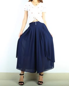 Chic High-waist Baggy Harem Pants, Chiffon Stretch Bottoms In Solid Color, Chic High Waist Flowy Bottoms, Chic Flowy Blue Bottoms, Versatile Wide-leg Harem Pants, Baggy Wide-leg Summer Culottes, Solid Non-stretch Ankle-length Wide Leg Pants, Wide Leg Pants With Wide Waistband For Spring, Flowy Solid Color Wide Leg Maxi Skirt