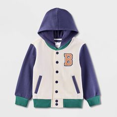 Bring a smile on to your toddler's face by gifting them this Bluey Hooded Varsity Jacket. This printed hooded varsity jacket is made from midweight fabric with ribbed cuffs and a ribbed hem for snug comfort and a neat finish, while the button-front design allows for versatile dressing. Plus, two side pockets come in handy for stashing small toys. Designed in a cream hue with purple sleeves and green ribbed cuffs, it features a "B" applique patch on the chest and a Bluey graphic on the back for a