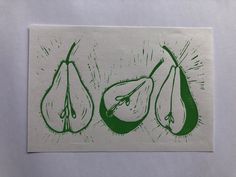 a piece of paper that has some type of fruit on it, with green ink