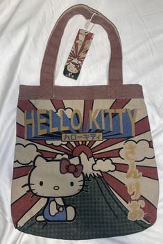 This rare Loungefly Sanrio Hello Kitty tote bag is a must-have for any Hello Kitty fan! Featuring beautifully embroidered accents and made of durable canvas, this bag is not only stylish but also practical for everyday use. With its multicolor exterior and Sanrio product line, it's the perfect addition to any collection. Designed for women and brand new with tags, this Loungefly Sanrio Hello Kitty tote bag is a statement piece that will surely turn heads. Please see pictures for exact items you Hello Kitty Print Shoulder Bag For Travel, Hello Kitty Print Travel Shoulder Bag, Hello Kitty Print Tote Bag For Daily Use, Hello Kitty Print Tote Shoulder Bag For Shopping, Rectangular Hello Kitty Print Shoulder Bag For Shopping, Casual Hello Kitty Bags For Daily Use, Casual Hello Kitty Print Bags For Shopping, Casual Hello Kitty Print Tote Shoulder Bag, Casual Rectangular Bag With Hello Kitty Print