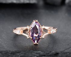 Unique marquise cut amethyst wedding ring , purple amethyst with prong setting , very special gift for women. ★Description *Center stone: 5x10mm Marquise Cut Classical Purple Amethyst. *Accent stone: 0.11 carat Round Cut Moissanites * Material: Sterling Silver with White/Yellow/Rose Gold Plated or Solid 14k Gold( White/Rose/Yellow gold) *Band Width(Bottom): 1.6-1.7mm Gemstone can be replaced with other birthstone, if you would prefer a custom ring, please contact us. ★Procedure information Pleas Luxury Amethyst Ring With Accent Stones For Promise, Victorian Luxury Amethyst Wedding Ring, Amethyst Marquise Ring, Purple Gemstone Ring, Luxury Marquise Amethyst Ring For Anniversary, Non Traditional Engagement Rings Purple, Purple Marquise Cut Promise Ring, Amethyst Marquise Cut Wedding Rings, Purple Solitaire Birthstone Ring For Wedding