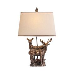 a lamp that has two deer on it