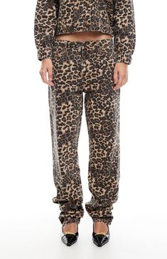 Make a fierce statement with the Leopard Carmela Straight Leg Jeans from LIONESS. Featuring a bold leopard print, low-rise fit, straight leg openings, and a narrow fit, these jeans offer an edgy and stylish look that's sure to turn heads wherever you go.Leopard print Low-riseZip fly closure5-pocket bodyStraight leg openingsNarrow fit100% cottonMachine washableModel is wearing a size small LIONESS Womens Leopard Carmela Straight Leg Jeans - Leopard Animal Print size XS Casual Leopard Print Straight Leg Bottoms, Trendy Relaxed Fit Leopard Print Bottoms, Trendy Straight Leg Leopard Print Jeans, Fall Straight Leg Leopard Print Pants, Cotton Wide Leg Leopard Print Pants, Casual Leopard Print Straight Leg Jeans, Casual Straight Leg Leopard Print Jeans, Straight Leg Cotton Pants In Leopard Print, Trendy Cotton Leopard Print Pants