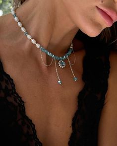 Add a touch of elegance and charm to your outfit with this stunning Shiny Perl Jewelry Set! This beautiful set includes a mesmerizing Blue Cristall Choker Necklace and matching Bracelet, perfect for adding a pop of color to any look. Whether you're a bride looking for your Something Blue or searching for a special Birthday Gift for Her, this set is sure to impress. Handcrafted with care and attention to detail, this jewelry set is a versatile addition to any jewelry collection. Make a statement and stand out with this one-of-a-kind set that shines with sophistication and style. An elegant necklace made of pearls, jewelry glass beads and cubic zirconia An exciting combination of tenderness and shine! This exquisite necklace will become a real decoration of your jewelry collection. A sophist Bride Something Blue, Romantic Birthday Gifts, Jewelry Bride, Birthday Gift For Girlfriend, Romantic Birthday, Pearls Jewelry, Jewelry Glass, Special Birthday Gifts, Blue Birthday