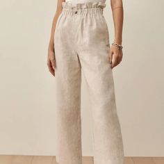 - Reformation Brand - Size 6 - Linen Material - High-Waist - Ruffled, Elastic Waist Band - Front Pockets - Roomy And Comfortable - Brand New / Nbw / Tags Still Attached!!!! High-waist Linen Bottoms In Neutral Color, Elegant Neutral Bottoms With Elastic Waistband, Neutral Trousers With Elastic Waistband, Beige High Waist Bottoms, Chic Beige Pull-on Style Pants, Neutral High Waist Wide Leg Linen Pants, Neutral High Waist Relaxed Fit Pants, Neutral High-waist Relaxed Fit Pants, High Waist Neutral Bottoms With Elastic Waistband