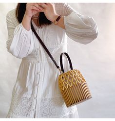 Elena Handbags Summer Bamboo Bucket Shoulder Purse Chic Formal Rectangular Straw Bag, Chic Rectangular Straw Bag For Formal Occasions, Elegant Natural Color Shoulder Bag, Elegant Handwoven Bucket Shoulder Bag, Luxury Evening Straw Bag With Bamboo Handle, Summer Evening Straw Bag With Bamboo Handle, Elegant Handheld Woven Bags, Evening Rectangular Straw Bag With Bamboo Handle, Rectangular Straw Bag With Bamboo Handle For Evening