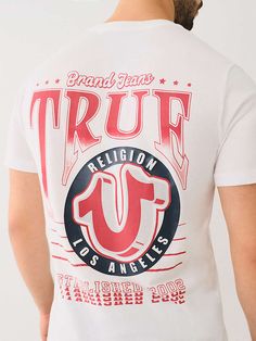 Show some True spirit with our iconic Team Spirit Tee. Crafted from 100% cotton fabrication, it features a crew neck, chest horseshoe logo, and short sleeves. On the back find conversational graphics blending True Religion branding. 
Style:
700193 Horseshoe Logo, Kids Denim, Jeans Kids, Short Shirts, Pant Shirt, Light Wash Denim, Jeans For Sale, Denim Shop, Team Spirit