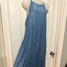 New Appraisal Long Denim Dress 100% Lyocell Spaghetti Strap, Size L (Nwot) This Of-The-Moment Denim Dress Is Long And Lean. Made Of Super Soft Lyocell Fabric, It Has Racer Back Spaghetti Straps, A High Scoop Neck A Side Zip, And Ties In The Back. The Hem Has A Pretty Frayed Fringe Finish. Perfect For Any Spring/Summer Gathering. (Nwot) Size: Bust: 21” Hips: 24” Length: 41” Summer Stretch Denim Blue Dress, Stretch Denim Blue Dress For Summer, Spring Dresses With Spaghetti Straps And Medium Wash, Summer Denim Dress With Spaghetti Straps, Casual Summer Denim Dress With Spaghetti Straps, Casual Denim Dress With Spaghetti Straps For Summer, Casual Spaghetti Straps Denim Dress For Summer, Summer Dresses With Spaghetti Straps In Medium Wash, Spring Stretch Denim Midi Dress