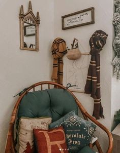 a chair with many pillows on top of it