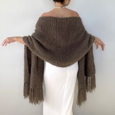 Wedding brown bridal shawl, taupe wrap, wool cover up, fall winter wedding, fringed evening scarf, bridesmaid gift,warm, rectangle This versatile taupe wrap piece not only complements any outfit but also provides warmth and protection from the chilly weather throughout fall, winter, and spring. These cover up's make an excellent bridesmaid gift. Fuzzy and warm yarn. it is not itchy at all. My proucts are handmade. MATERİAL: 10% mohair, 10% wool, 80% premium acrylic-Polyamid, COLOR:TAUPE (AS SHOW Elegant Fringed Shawl Scarf, Elegant Fringed Scarves For Fall, Elegant Fringe Shawl Scarf, Beige Fringed Shawl For Winter, Beige Fringed Winter Shawl, Winter Beige Fringe Shawl, Elegant Beige Wrap For Fall, Elegant Beige Wraps For Fall, Elegant Fringed Shawl For Winter