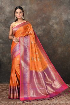 Buy beautiful orange Banarasi sari online in USA with pink purple zari border. Look royal at weddings and festive occasions in exquisite Banarasi sarees, handwoven sarees, tussar silk sarees, Bollywood sarees, partywear sarees from Pure Elegance Indian saree store in USA.-full view Pink Fitted Banarasi Silk Pre-draped Saree, Transitional Pink Banarasi Silk Pre-draped Saree, Purple Banarasi Silk Pre-draped Saree, Purple And Pink Border Sarees, Orange Semi-stitched Banarasi Silk Pre-draped Saree, Fashion Journals, Tussar Silk Saree, Traditional Fabric, Bollywood Saree