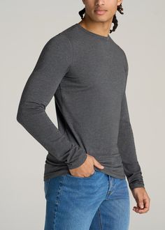 About Our Long Sleeve T-Shirt for Tall Men Wear it on its own or as a base layer. This slim-fit shirt for tall men will become your new everyday essential. When you're over 6'3”, finding quality tall men's tees can be a struggle – but we're here to change that. We designed this long sleeve to be the ultimate staple tee you can wear with anything. It looks just as good on its own with a pair of jeans as it does underneath a button-up shirt, with extra-long sleeves that will cover your wrists and Midweight Crew Neck Top, Solid Midweight Crew Neck Tops, Scrubs Dress, Cozy Sleepwear, Tall Men, Men Wear, Extra Long Sleeves, Sports Blazer, Long Sleeve Tee Shirts