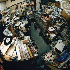 a room filled with lots of records and cds